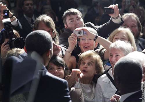 Obama greets audience members after speaking at a fundraiser in Seattle. 