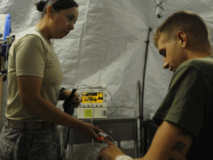 Photo, service members utilizing DLA Troop Support supplies