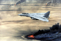 A U.S. Navy F-14A Tomcat from Fighter Squadron 211 flies over burning Kuwaiti oil wells during Operation Desert Storm. 