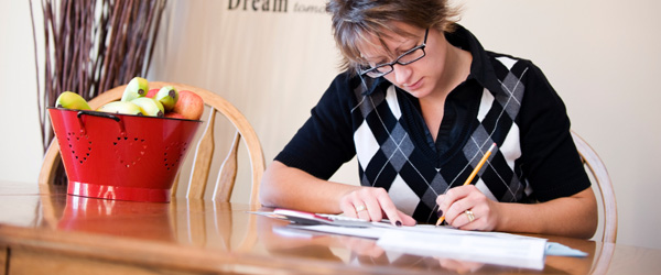 A woman records the locations of her important documents