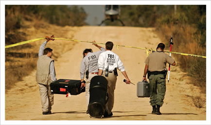 Members of the FBI Jacksonville Evidence Response Team, January 2006 , outside of Ocala, Florida. Photo courtesy of The Gainesville Sun, Tracy Wilcox