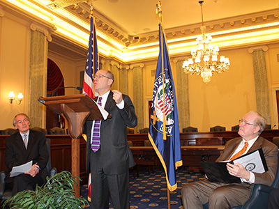 FTC Chairman Jon Leibowitz at podium during press conference