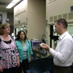 Derek Patton discusses the POSS system with NCPTT Scientists during a visit to USM