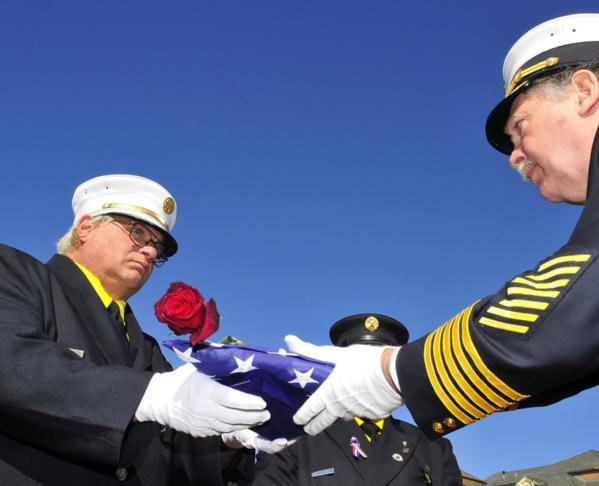 As part of the Fallen Firefighters memorial service, firefighters and family members honor those who have lost their lives serving their communities.