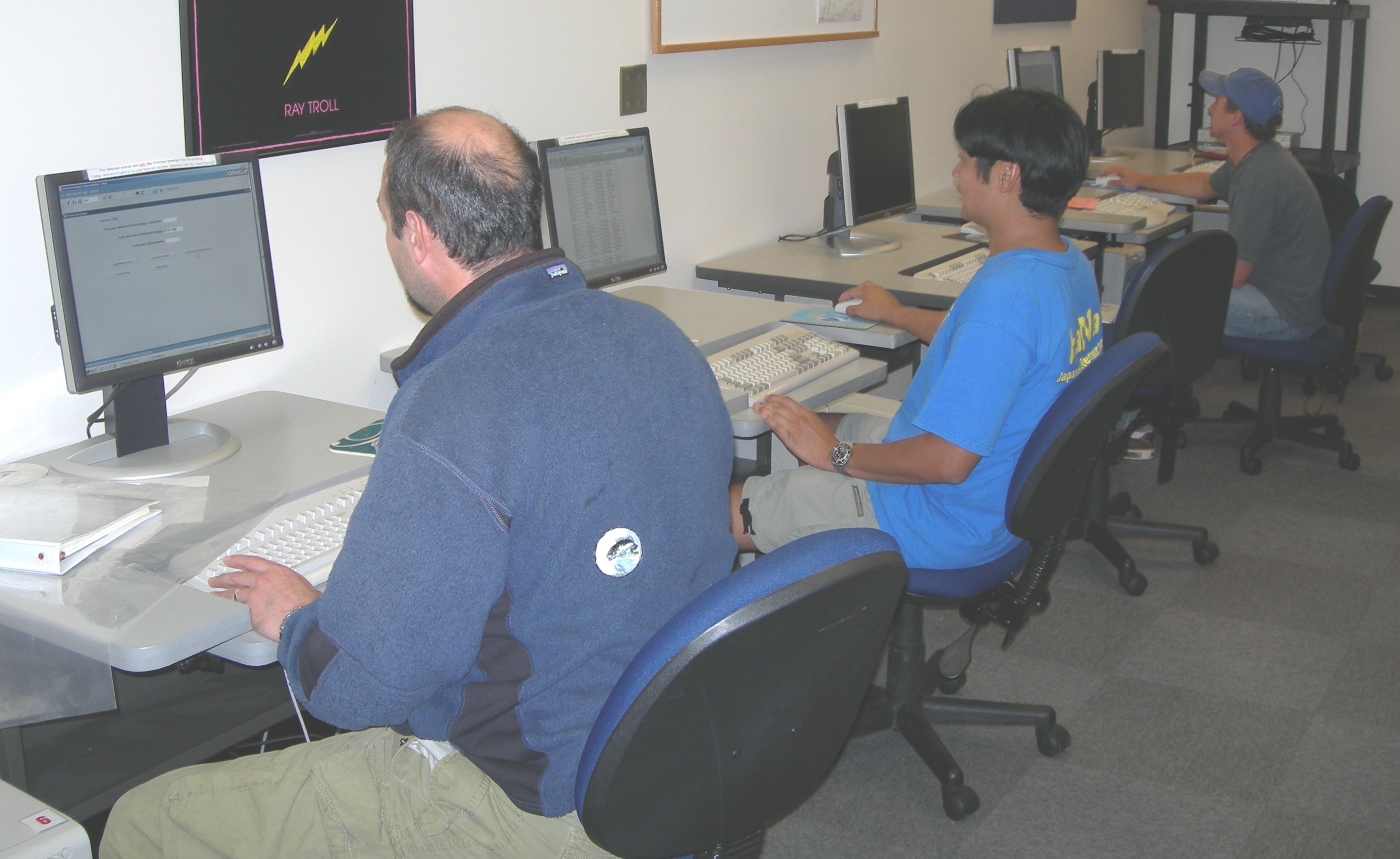 observers at the computers