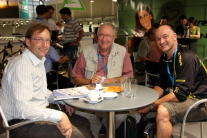 Gerd Klose, Managing Director of DeFeet's distributor in Germany Lynn Moretz, VP International Sales and Shane Cooper, founder of DeFeet display their products during the Eurobike show in Friedrichshafen, Germany. (Photo DeFeet)