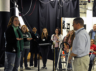 Dr. Joe Seay, a biomechanist in the Military Performance Division at USARIEM, briefs on the capabilities of a force sensing treadmill and the importance of biomechanics research in studying military load carriage