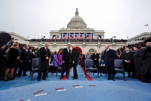 President Barack Obama talks with Vice President Joe Biden during the inaugural swearing-in ceremony 