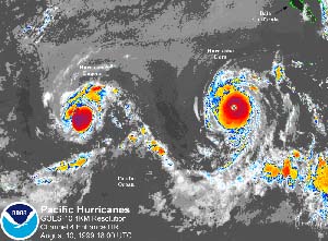 NOAA satellite image of Hurricanes Dora and Eugene in the Eastern Pacific taken Aug. 10, 1999.