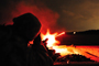 Soldiers assigned to 3rd Battalion, 157th Field Artillery, Colorado Army National Guard light up the range with tracer rounds as they fire the M240B medium machine gun with the help of night optics at Fort Hood, Texas. Photo by Liesl Marelli.