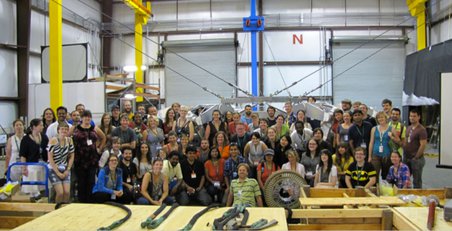 AbGradCon attendees visiting the ATHLETE rover prototype at JPL.