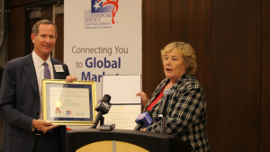 Congresswoman Zoe Lofgren presents Ron Sege, CEO of Echelon Corporation with the U.S. Commerce Department’s Export Achievement Certificate.