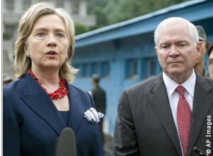 Secretary Clinton, left, and Defense Secretary Gates announce sanctions against North Korea outside the Demilitarized Zone on July 21.