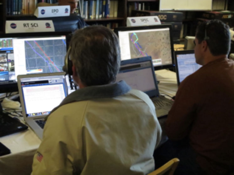 Picture of two ARC team members at their consoles in Hawaii