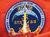 The STS-133 mission patch.