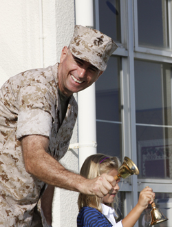 Military father ringing in the SY with daughter.