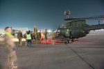 Soldiers from 2nd Squadron, 17th Cavalry Regiment pull an OH-58D Kiowa Warrior...