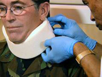 Photo of person receiving neck support.