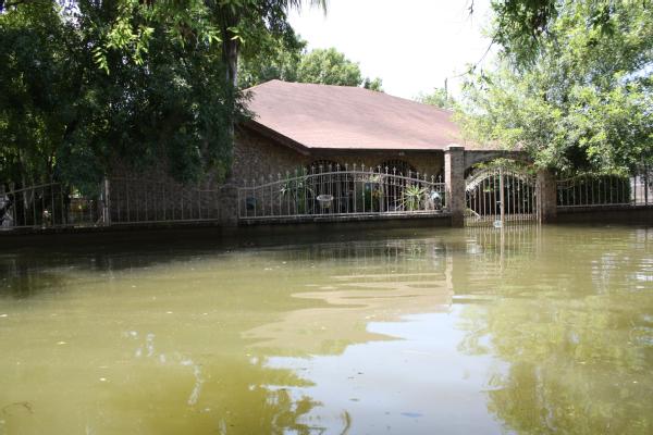 Waters of the Rio Grande flooded parts of the city of Roma after Hurricane Alex. More than three feet of water flooded this house.