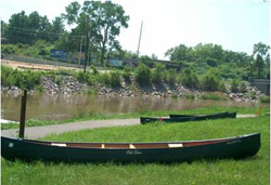 Canoes by the river