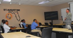 Lt. Col. Dan Mahnke, deputy state surgeon for the Florida National Guard, speaks to health care professionals from the Regional Security System countries of Dominica, St. Vincent and the Grenadines, Grenada, Barbados and Antigua during a subject matter exchange on electronic medical records management in St. Augustine, Fla., July 11, 2012. The National Guard's State Partnership Program facilitated the exchange to promote improved continuity of care for Caribbean security forces. Photo by Sgt. 1st Class Blair Heusdens