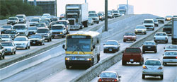 city transit bus and cars using a HOT lane