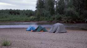 tents on a sand bar