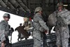 MIDDLE EAST (August 21, 2009) - Soldiers from the 13th Sustainment Command Expeditionary march onto a C-17 Globemaster III at an undisclosed location in the Middle East. Air Force crew members work with Third Army/USARCENT to transport service members, equipment and supplies to various locations around the Middle East in Support of Operation Iraqi Freedom and Enduring Freedom. Photo by Mass Communication Specialist 2nd Class Kim Harris, Third Army/U.S. Army Central Media Transit Team.