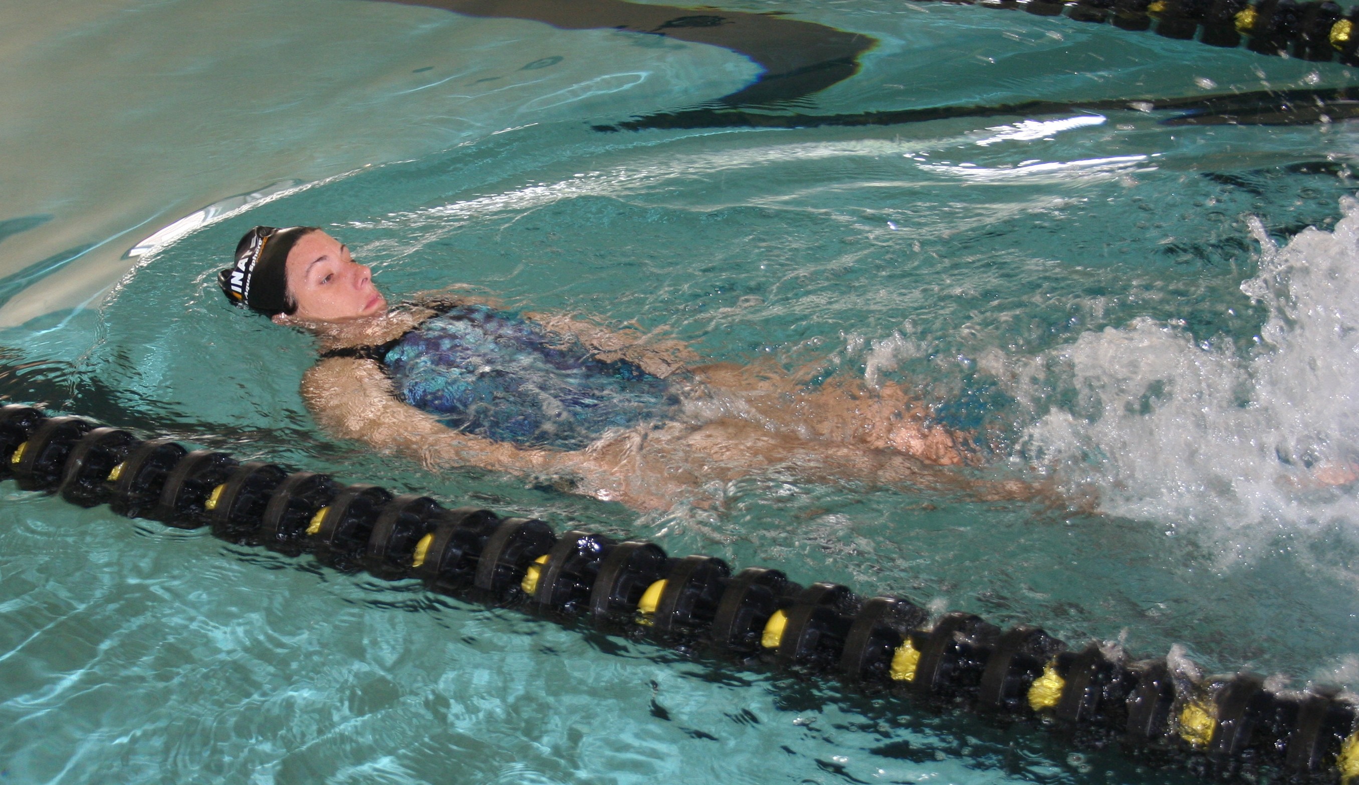 SSG Stefanie Mason, a Warrior Games Army swimmer, practicing her backstroke during a training session on Tuesday.