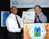 [Photo 20: Secretary Jackson receives a Homeownership Proclamation from Mayor Francis Slay]