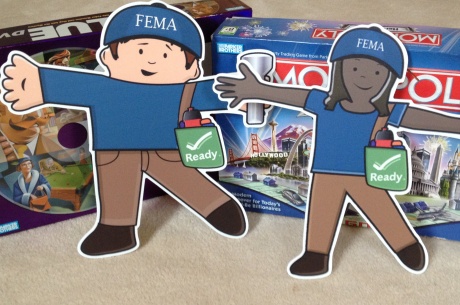 Flat Stanley and Flat Stella add a few games to their emergency supply kit.