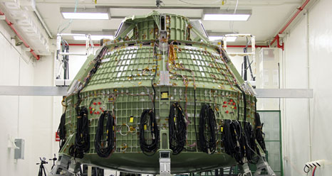 The Orion Exploration Flight Test 1 crew module undergoes proof pressure testing.