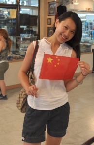 Holding a Chinese flag in the Palestinian market located in the West Bank