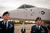 Airmen assigned to the 10th Air Support Operations Squadron at Fort Riley stand in front of a decommissioned Air Force jet bearing the name of Senior Airman Bradley Smith, who was killed in Afghanistan while serving with the Army’s 4th Infantry Division. (U.S. Army photo by Sgt. Roland Hale, 1st Inf. Div. Public Affairs)