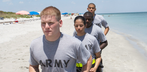 Cadets running on beach