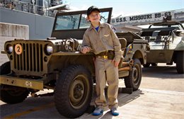 USS MISSOURI BATTLESHIP MEMORIAL - Carl Hornbeak-Hess, an 11-year-old from Mill Creek, Wash., stands in front of a World War II Army jeep at the USS Missouri Battleship Memorial, Feb. 15. Hornbeak-Hess, who has been diagnosed with acute lymphoblastic leukemia, dreamed of becoming a World War II Army Air Corps pilot whose aircraft is shot down and crash lands on a deserted island. He was granted his wish with the help of Marines, sailors and the Make-A-Wish Foundation. (U.S. Marine Corps photo by Lance Cpl. Nathan Knapke/Released) 


