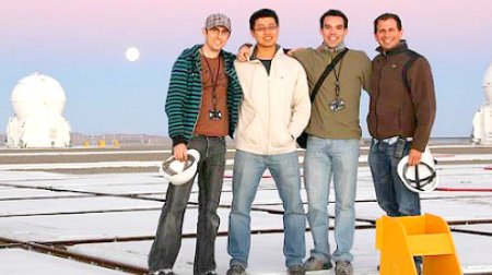 Eduardo Bendek (right) and the Optical Outreach Abroad team gathers at the Paranal Observatory platform during sunset.