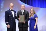 Photo 2: Lt Gen Rives, Mrs. Dunlap, and Tom Hagmaier, first winner of the Dunlap Award