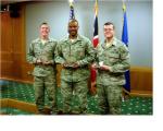 Photo 1: (L to R) Capt Jim Lisher, CGO of the quarter, MSgt Collis Stanley, SNCO of the quarter, and A1C Brian Newton, Airman of the quarter