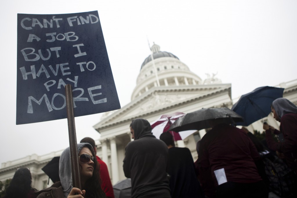 College students and faculty protest at the State Capitol in Sacramento, California (Photo: REUTERS/Max Whittaker)