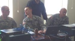 Soldiers+from+2%2f1+setting+up+a+network+in+the+IT+Networking+and+Cisco+Routing+course.