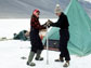 Photo of women geoscientists using a hand augur to drill Lake Vanda, Antarctica, in 1969-1970.