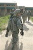 CAMP TAJI, Iraq (May 15, 2008) - Spc. Garret Simoneau, a Wichendon, Mass., native, prepares to set up a patrol base in the Taji Qada, located northwest of Baghdad, May 15, giving coalition forces the ability to have an increased presence in the area and help reach out to the people of Iraq. Simoneau serves as an infantryman with Company A, 1st Battalion, 27th Infantry Regiment ?Wolfhounds,? 2nd Stryker Brigade Combat Team ?Warrior,? 25th Infantry Division, Multi-National Division ? Baghdad. Photo by Sgt. Brad Willeford, U.S. Army.