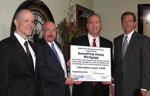 L-R: Orlando Housing Authority President Vivian Bryant; Agriculture Secretary Tom Vilsack; Rural Development Florida State Director Richard Machek and Rural Development Florida Single Family Housing Program Director Daryl Cooper participated in a business roundtable in Orlando, Fla., last Friday.  They discussed discuss the USDA Rural Development Home Refinancing Pilot Program which is available to USDA borrowers in 19 states.