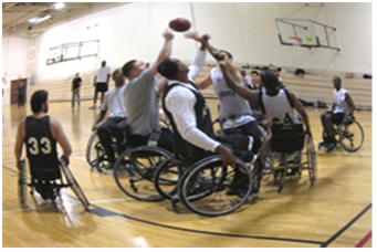 The Army wheelchair basketball team scrimmages with members of the WTC cadre.