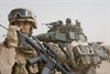 AL ASAD, Iraq (June 11, 2008) - U.S. Marine Sgt. Daniel Leach, 2nd Platoon, Delta Company, 2nd Light Armored Reconnaissance Battalion, Task Force Mech., Multi-National Force-West Ground Combat Element, talks to fellow Marines on the radio during Operation Defeat Al Qaida in the North in the Northern Al Anbar province, Iraq, on June 11. Photo by Cpl. Tyler Hill, U.S. Marine Corps.