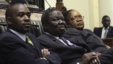 Zimbabwe Vice President Joice Mujuru (R), Prime Minister Morgan Tsvangirai (C) and member of the House of Assembly of Zimbabwe for Kuwadzana, Nelson Chamisa, attend the presentation of the Final Draft of the Constitution for debate in Parliament Building. 