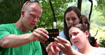 Teachers test water samples. Photo by CBF Staff