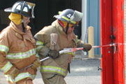 Fireman Accessing Building