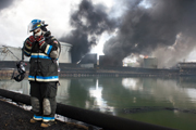 Firefighter at Power Plant Fire